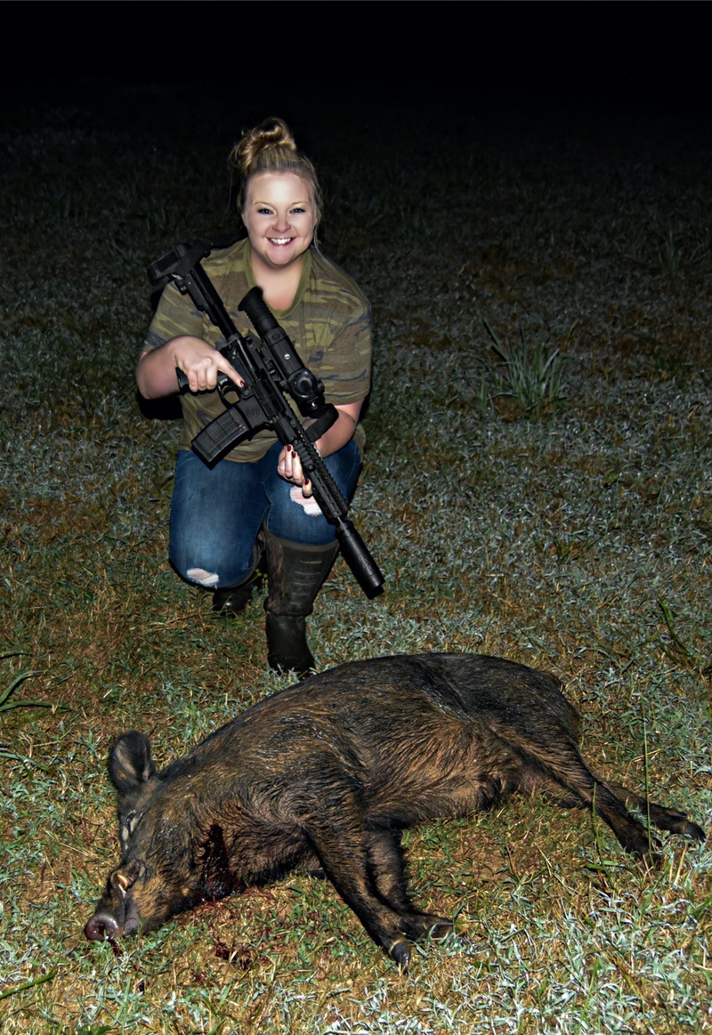 Brooklee Grant With Hog & SilencerCo Rifle