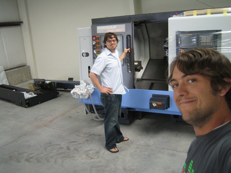 Jonathon Shults and Josh Waldron unloading an initial piece of equipment