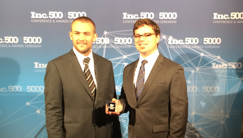 Jonathon Shults and Josh Waldron accepting an Inc 5000 award in 2013