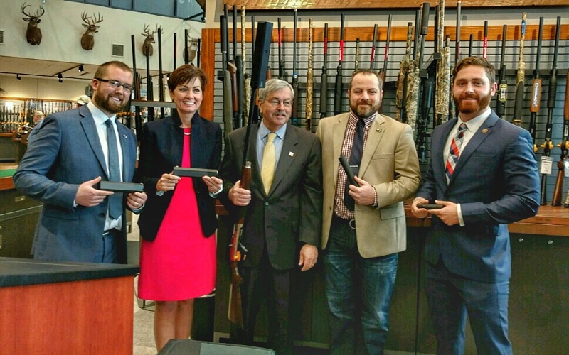 signing bill to legalize suppressors in Iowa