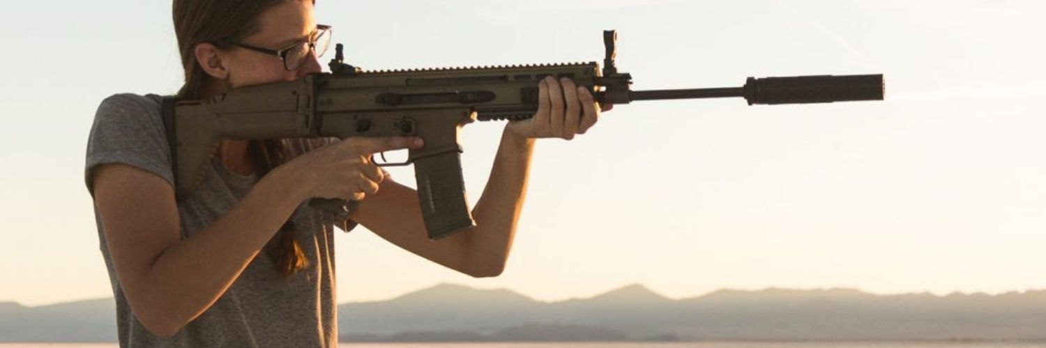woman shooting silencerco silencer on rifle