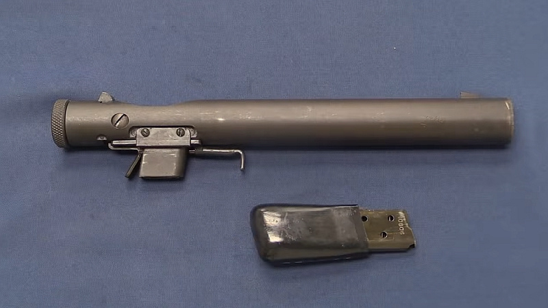 Welrod with magazine removed, similar in appearance to a bicycle pump.