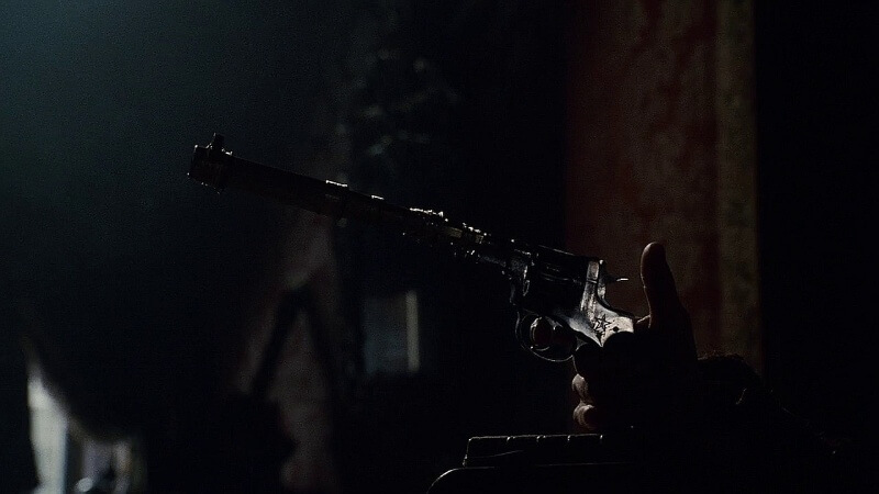 M1895 Nagant revolver with suppressor in 2009 Sherlock Holmes. silencers in cinema