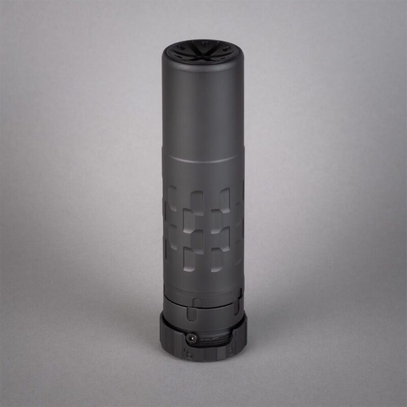 silencerco saker 556k suppressor on a grey background