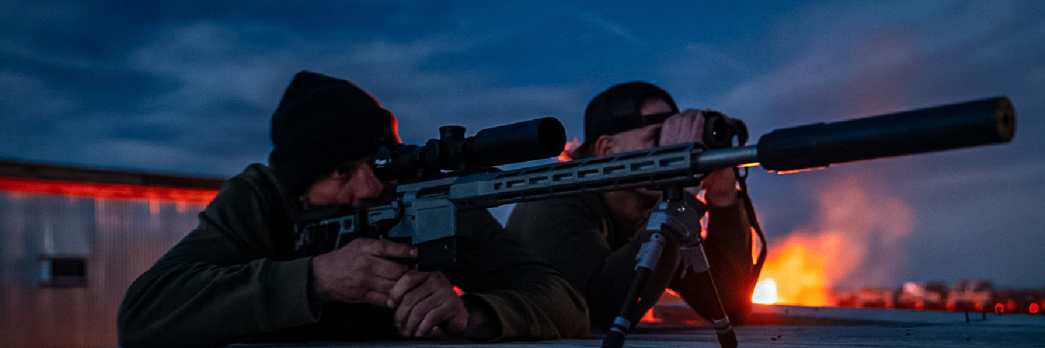 Cowboy Cerrone shooting a suppressed rifle. Photo credit: Free Range American