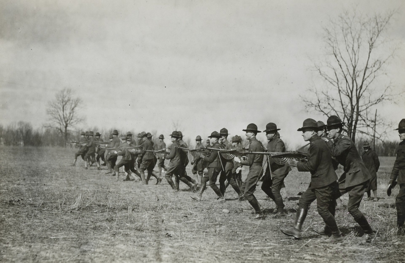 US Army soldiers carry the French Chauchat in a walking fire drill. (National Archives)