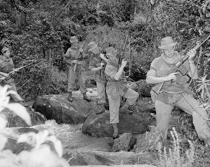 Two FAL-armed British soldiers lead a patrol in Kenya, during the 1952-1956 Mau Mau rebellion. (Imperial War Museum)