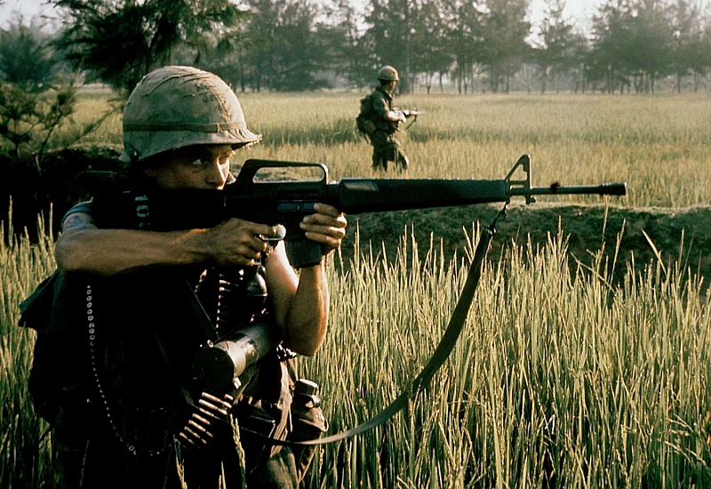 soldier shoots m16 in Vietnam