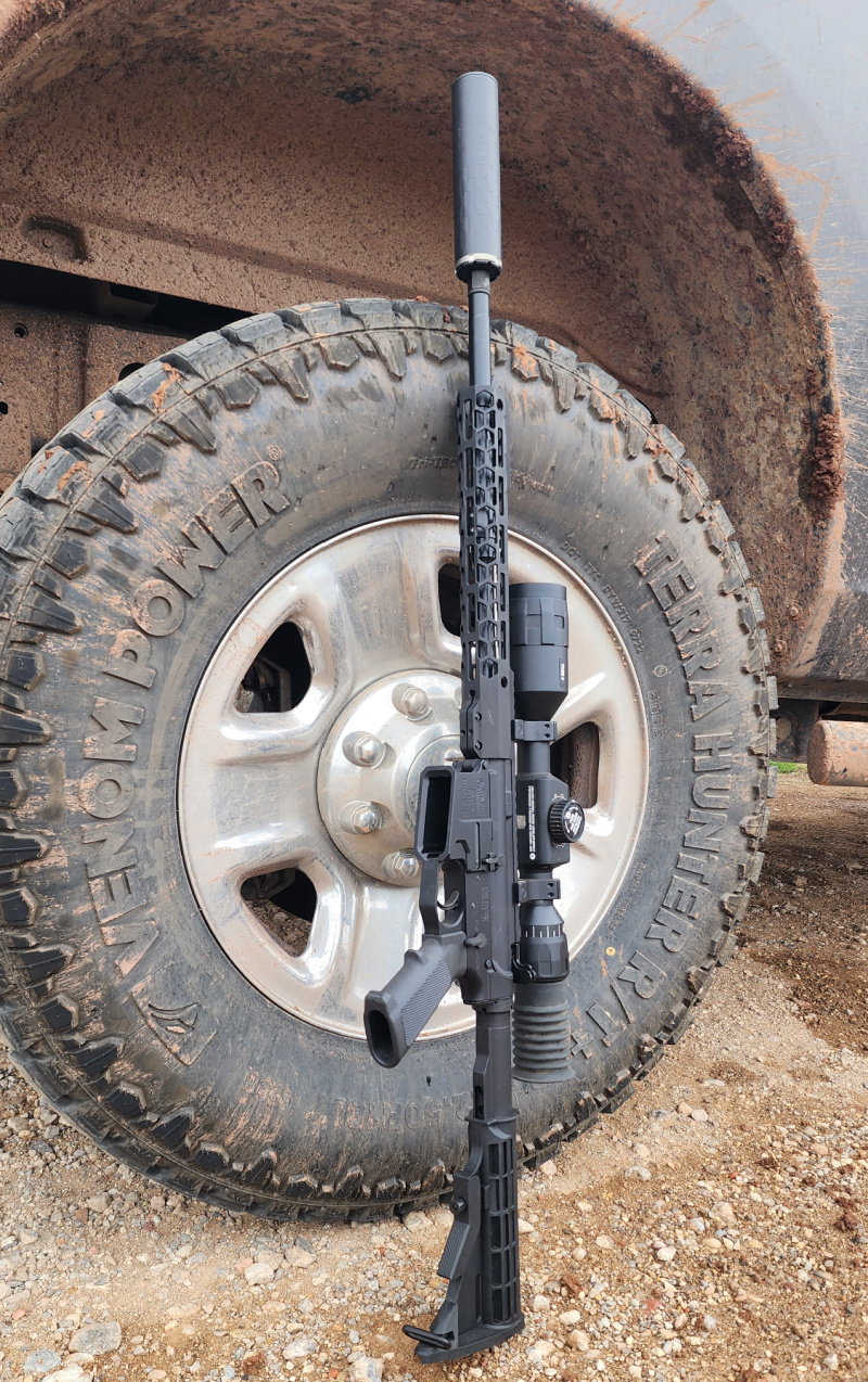SilencerCo Omega 300 on ACME Machine 25-215 rifle in 5.56