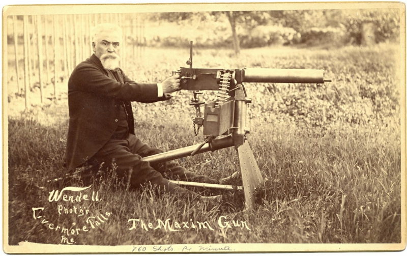 Sir Hiram Maxim with his namesake machine gun. (Public Domain)