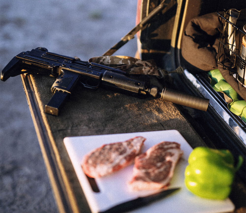 subgun with SilencerCo Spectre 9, camp dinner preparations