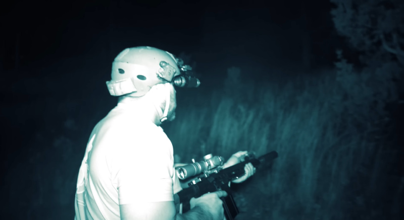 Mike Aland hunting small game, suppressed, using night vision goggles.