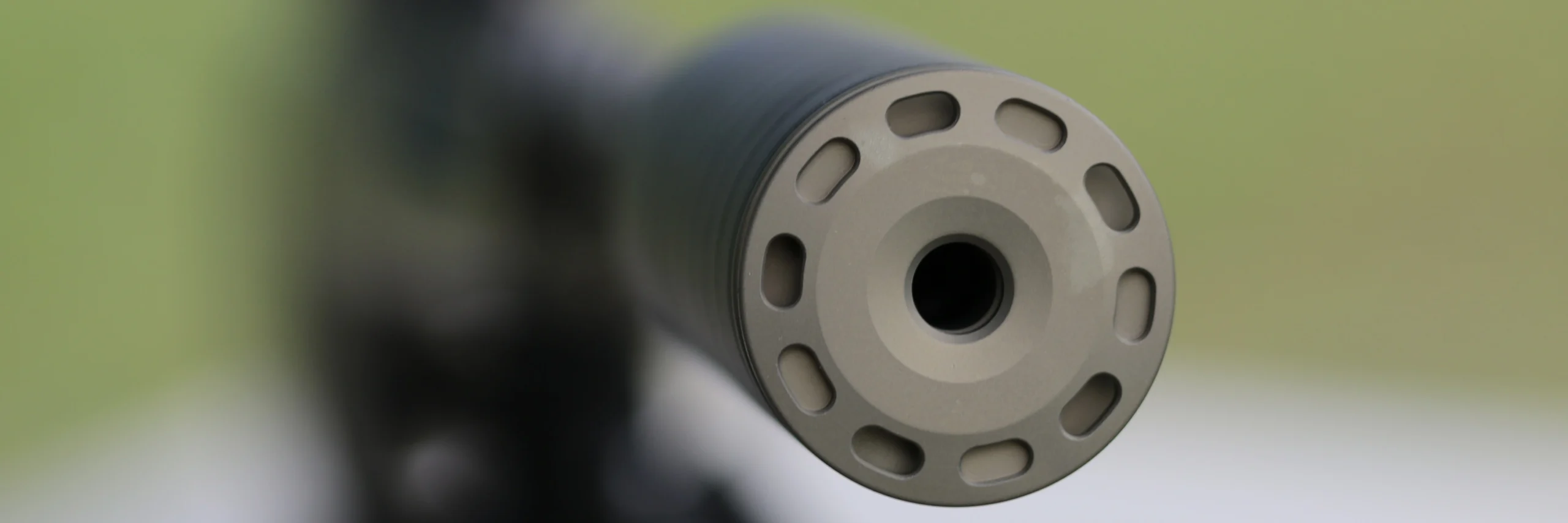 feature image front cap of SilencerCo Scythe Ti suppressor