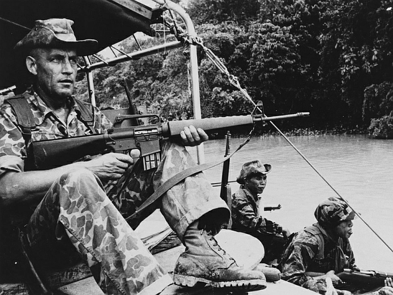 An American advisor in Vietnam with an early .223 Remington-chambered AR-15 in 1962.