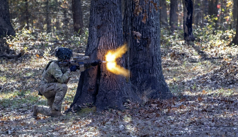 Soldier firing Next Generation Squad Weapon NGSW