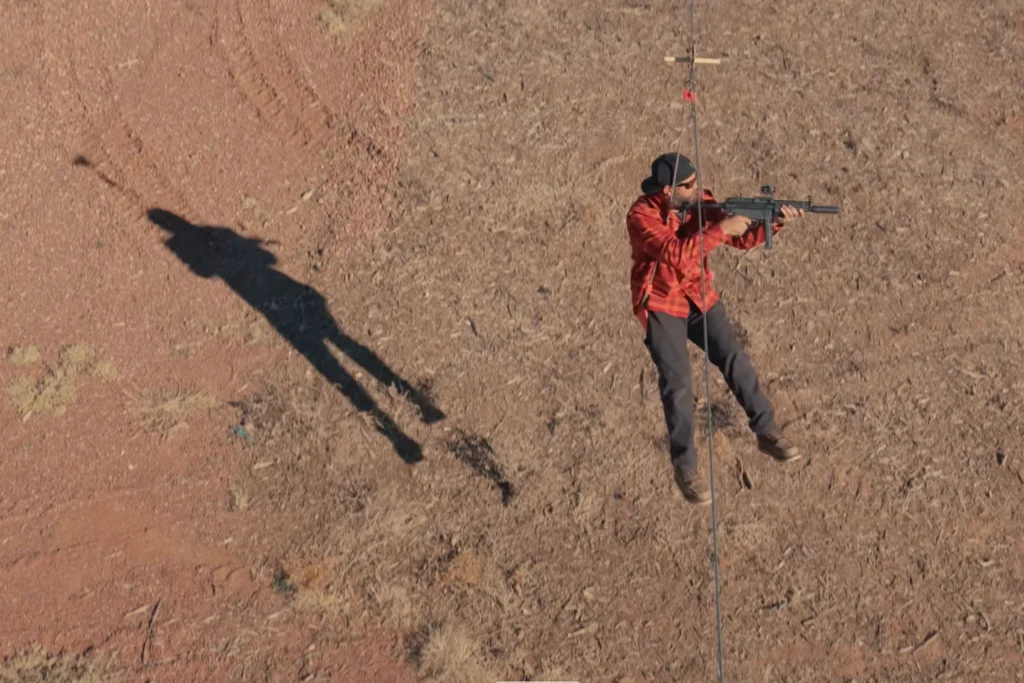 Cowboy Cerrone shooting suppressed from a zipline