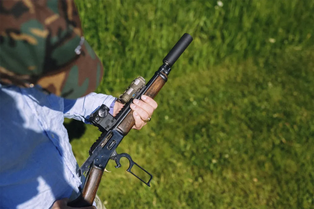 SilencerCo Spectre 9 on lever gun. Feature image for How To Get a Suppressor Tax Stamp
