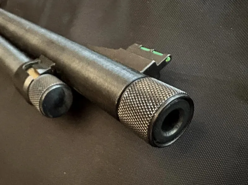 threaded barrel of Henry Lever Action rifle
