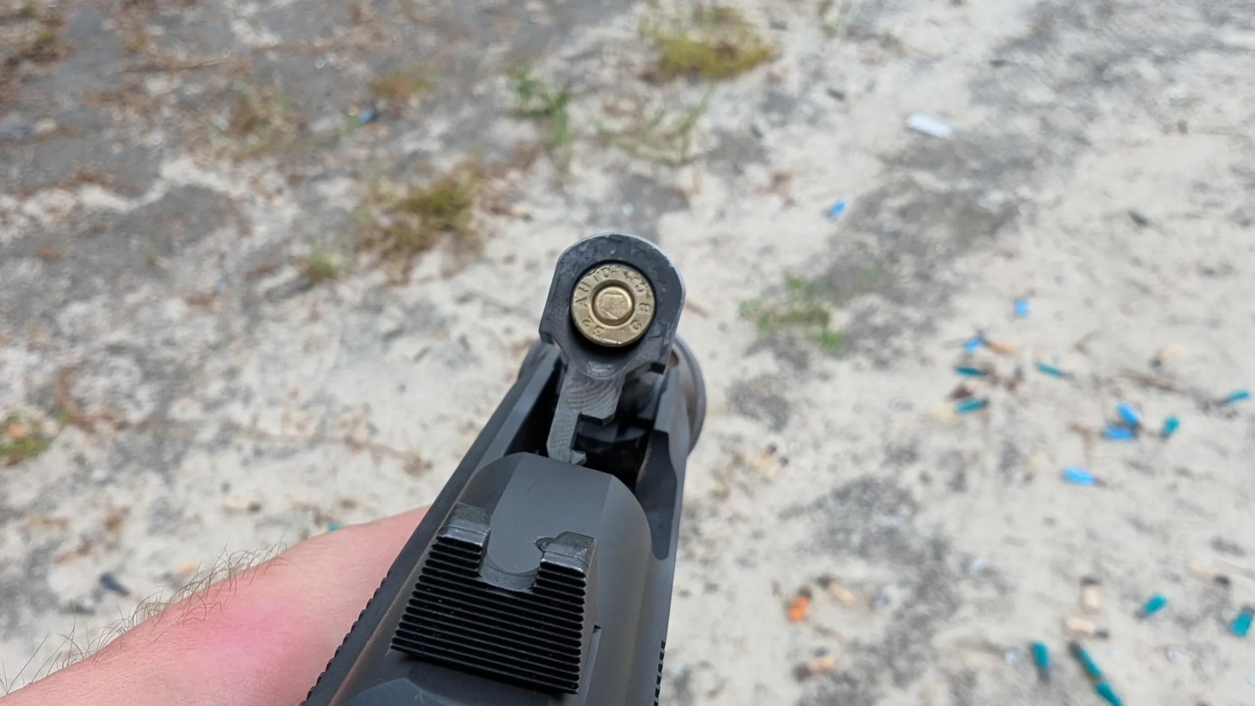 Beretta 30x, barrel tilted up with a round in the chamber
