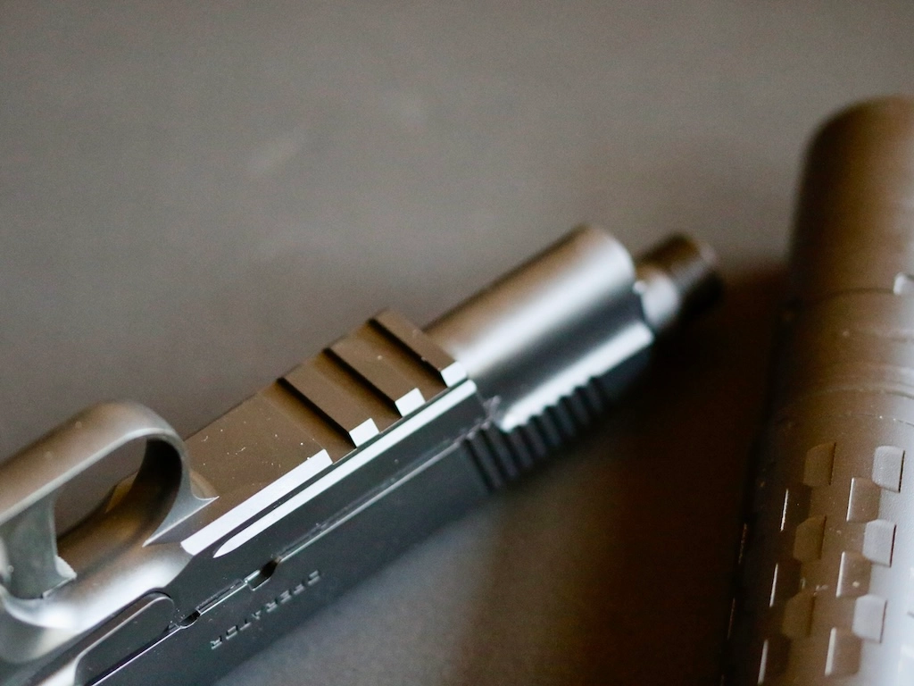 The Springfield Army Operator has room under the slide for a light, too. The full-sized 5” designs have some distinct advantages over the shorter compact designs.