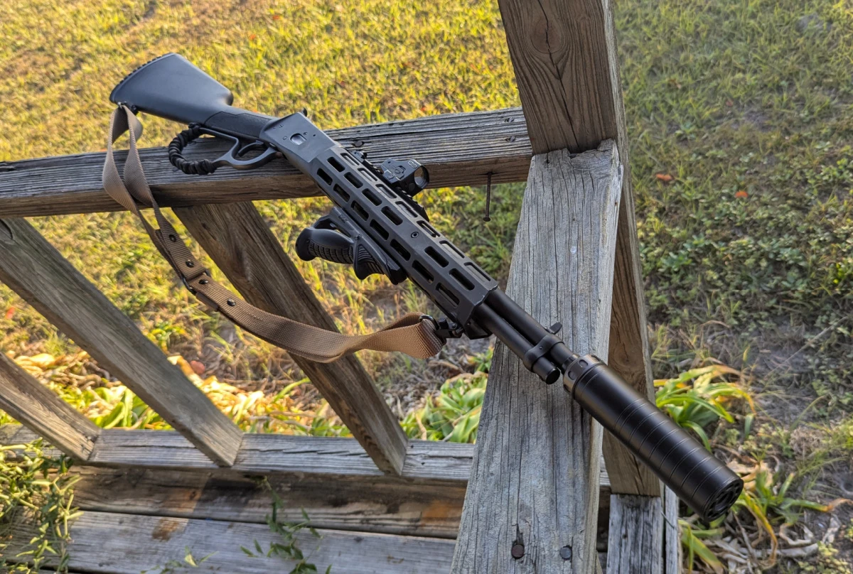 Citadel LevTac with SilencerCo suppressor attached, laying on deck rails