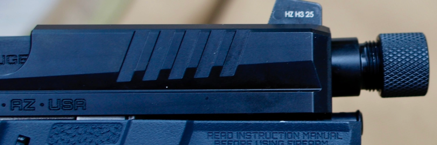 Ruger RXM closeup of slide and threaded barrel. Best Glock clone