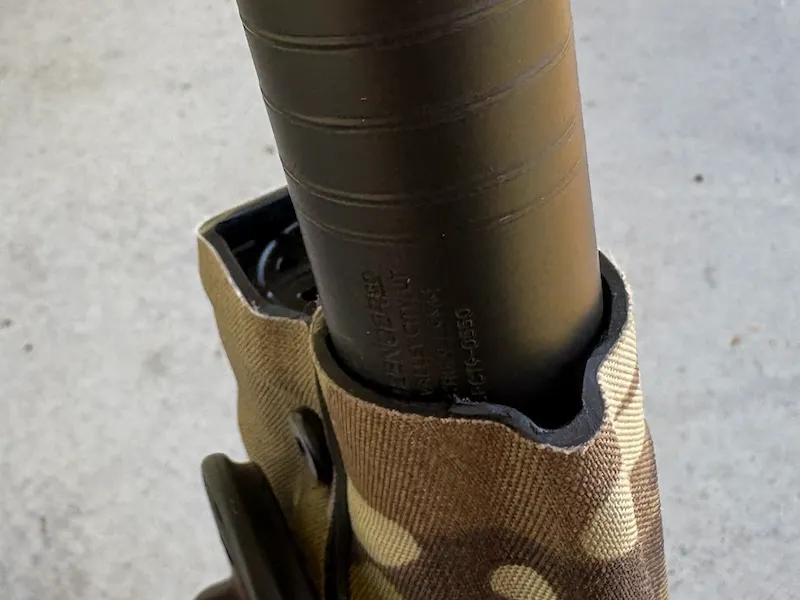 Spectre 9 suppressor in bottom end of Safariland suppressor holster