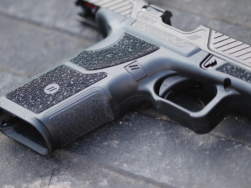 ZEV OZ9 with slide locked back and empty magwell