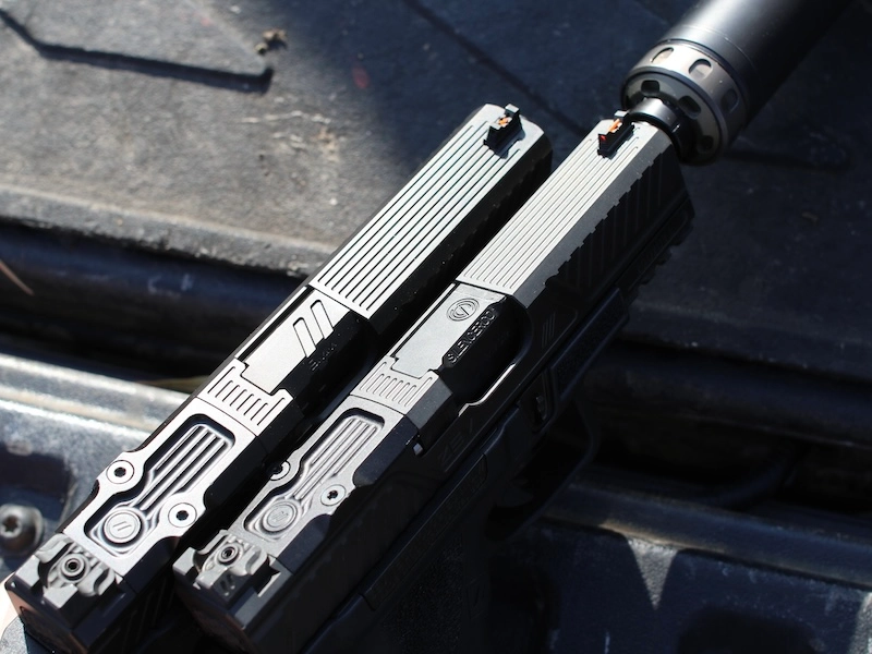 Optic cuts on two handgun slides