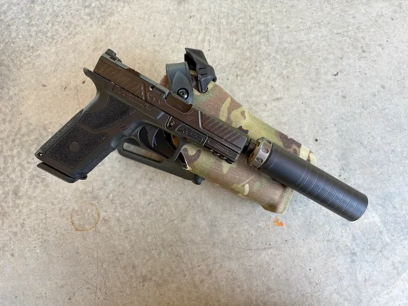 Zev OZ9 suppressed with SilencerCo Spectre 9 with Safariland 6TS RDSO suppressor holster in multicam
