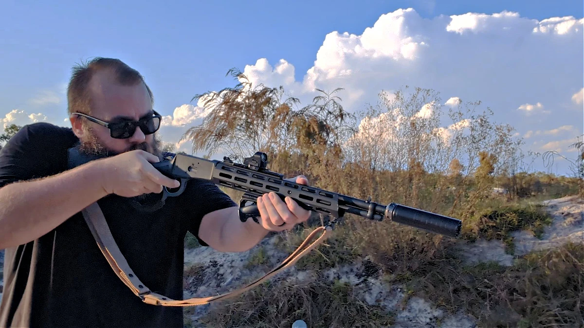 man shooting suppressed Citadel LevTac lever action rifle