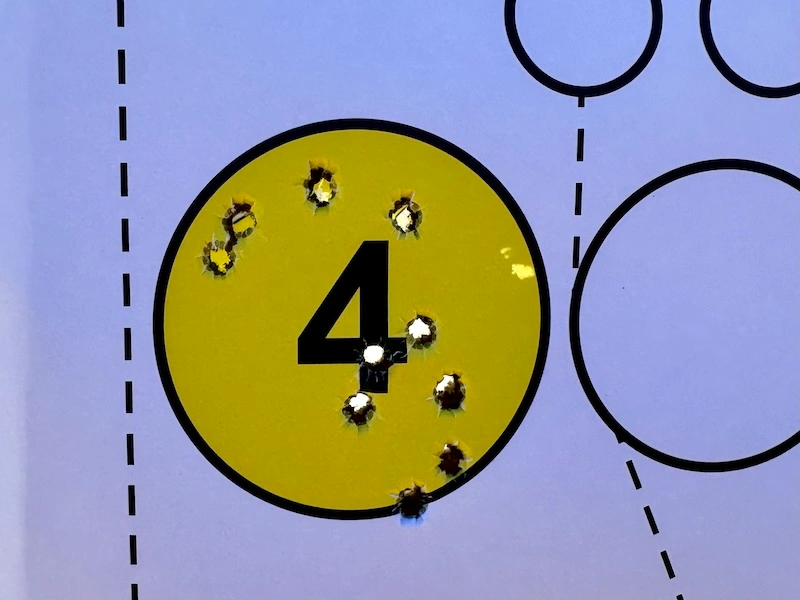 Target group, from the shoulder at 100 yards - 10 rounds in the yellow circle - .22 WMR
