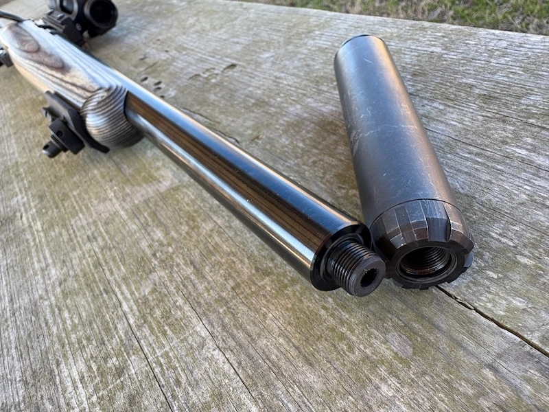 threaded barrel of ruger american rifle 22 wmr and silencerco sparrow