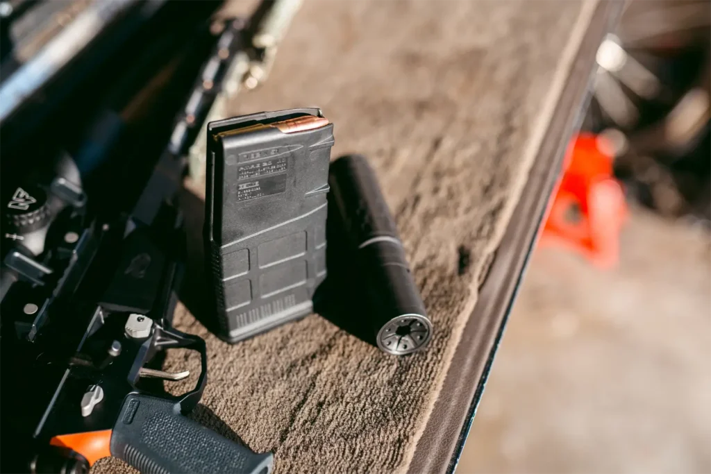 8.6 Q Fix, Hornady .338 ARC in magazine next to SilencerCo Omega 36M
