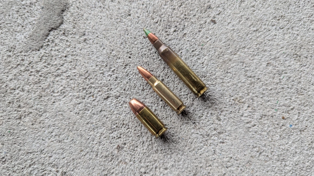 9mm, 5.7mm, and 5.56 cartridges side by side for comparison