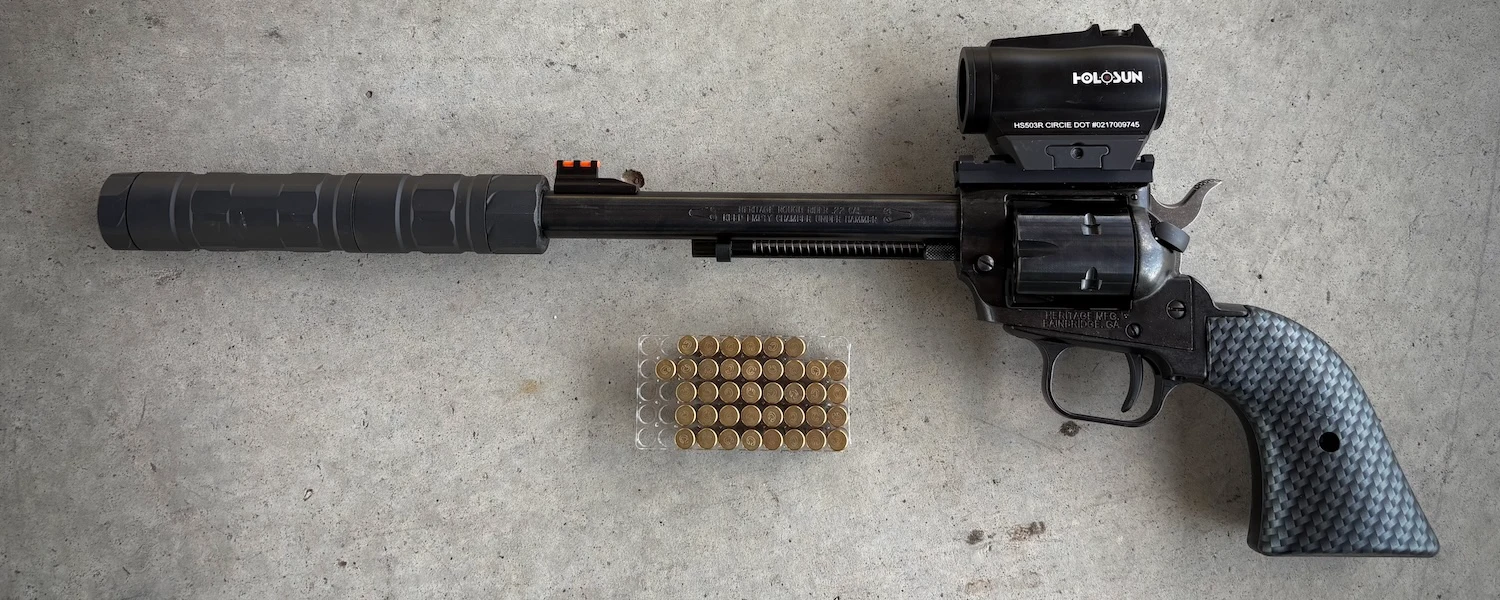 heritage rough rider revolver suppressed with SilencerCo Switchback 22, topped with Holosun HS503R