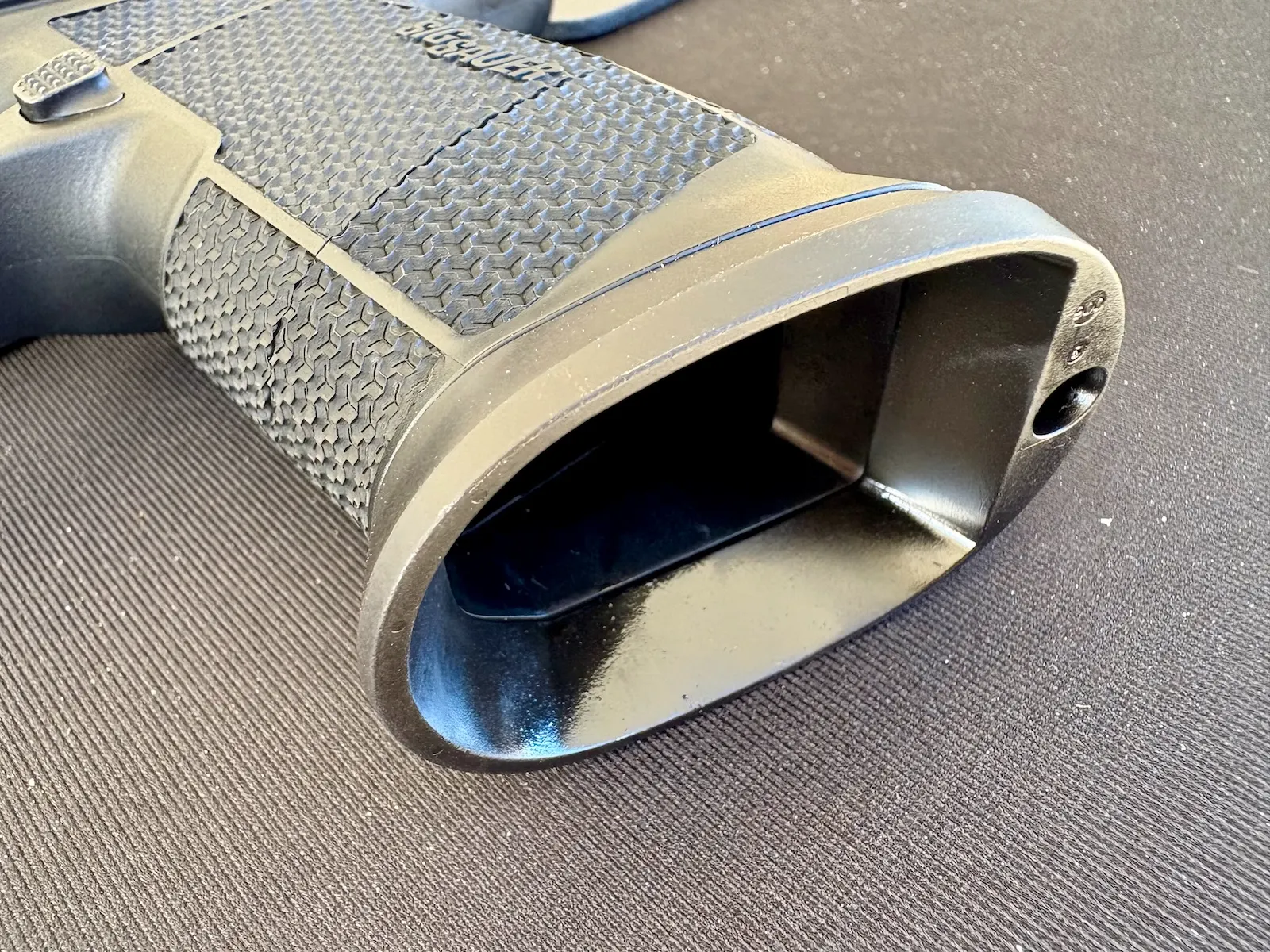Flared magwell of the Sig P385